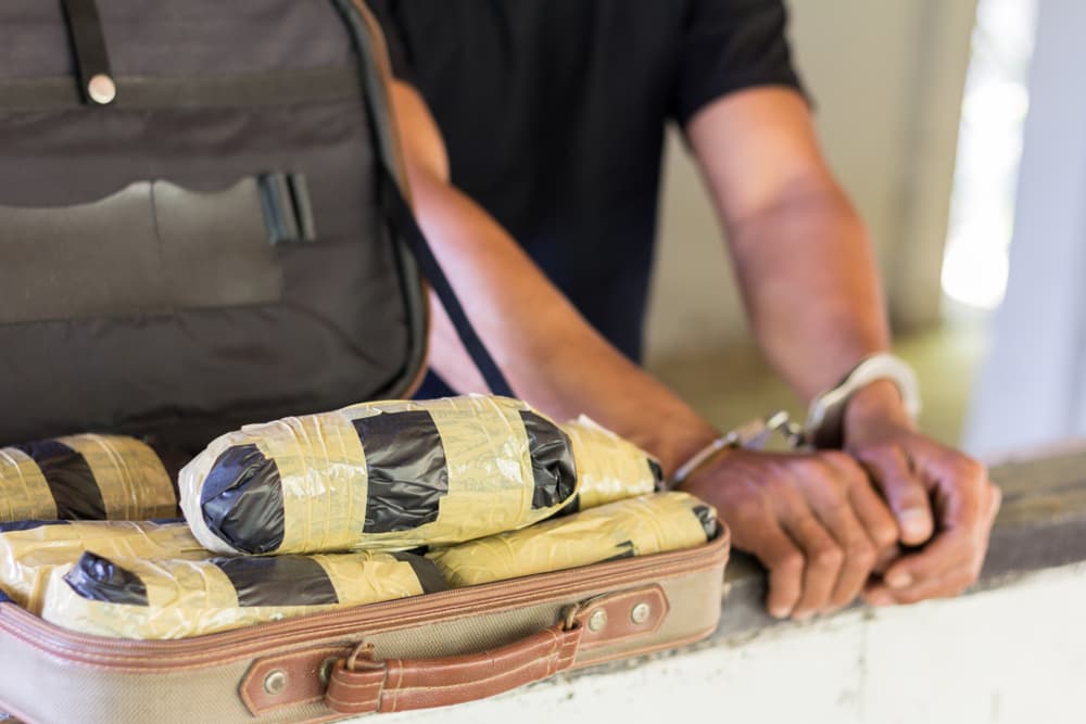 Drug traffickers were arrested along with their heroin.